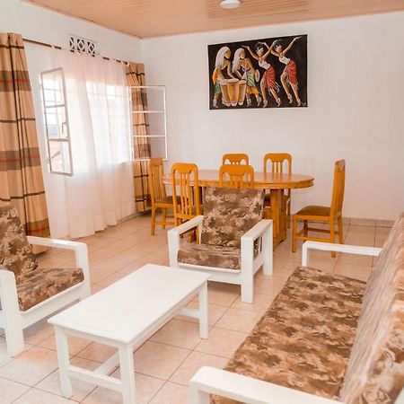 Auberge La Caverne Kigali Bagian luar foto