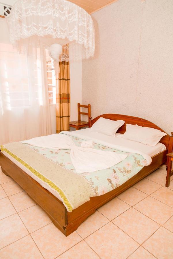 Auberge La Caverne Kigali Bagian luar foto