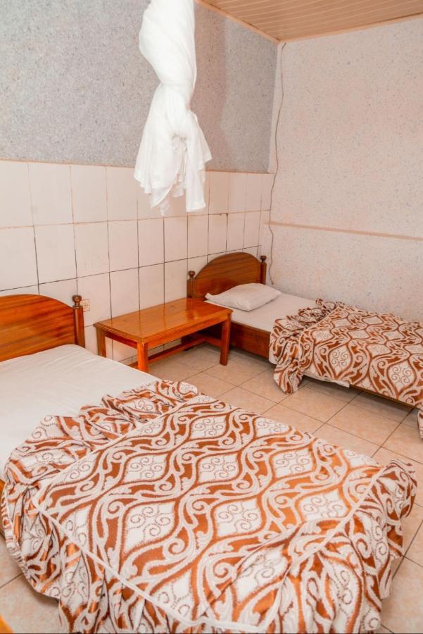 Auberge La Caverne Kigali Bagian luar foto