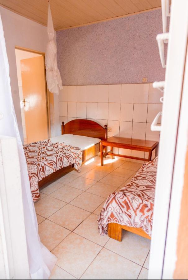 Auberge La Caverne Kigali Bagian luar foto